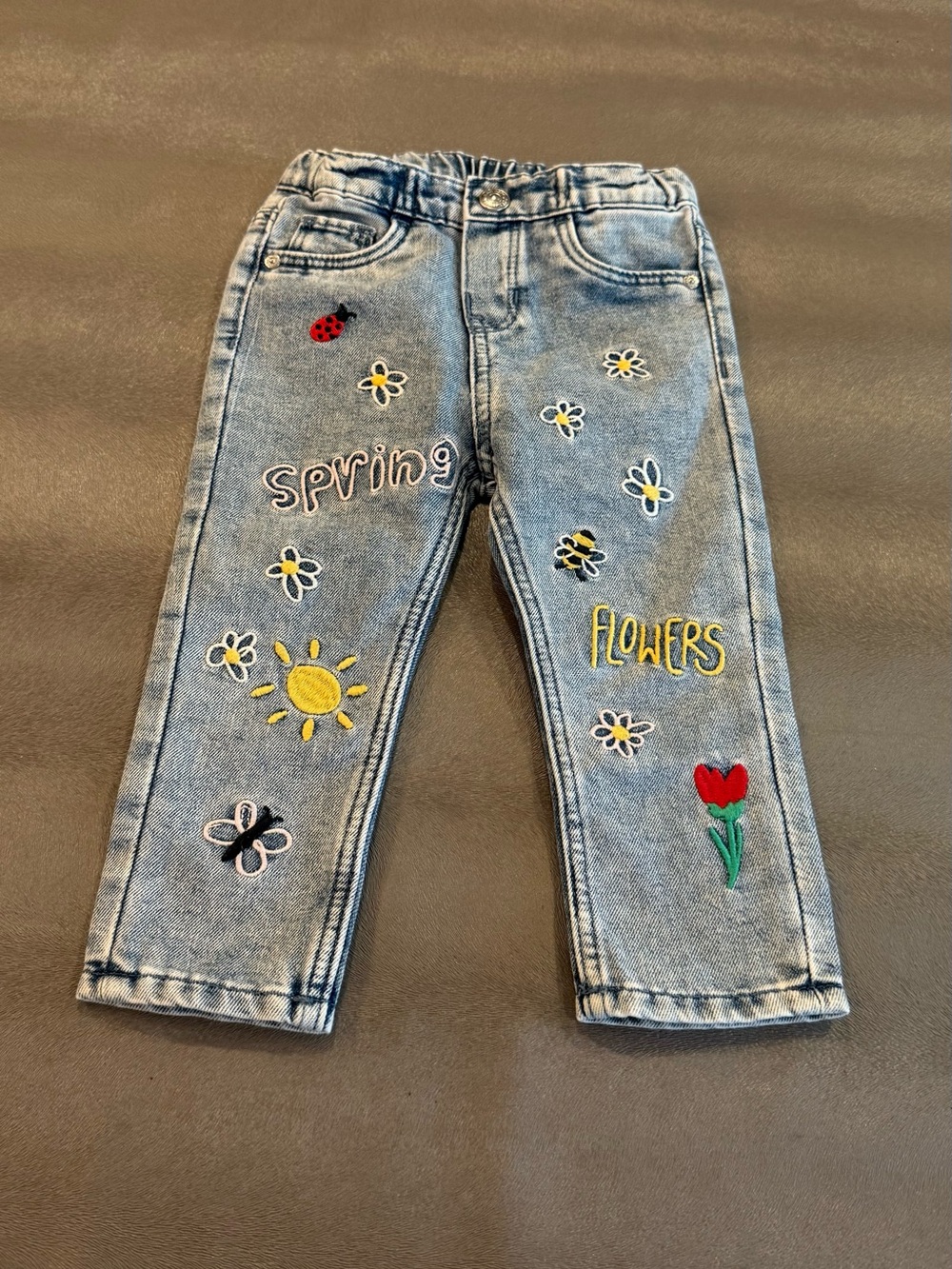 H&M Light Blue Denim Jeans with Spring Embroidery. Size 12 months